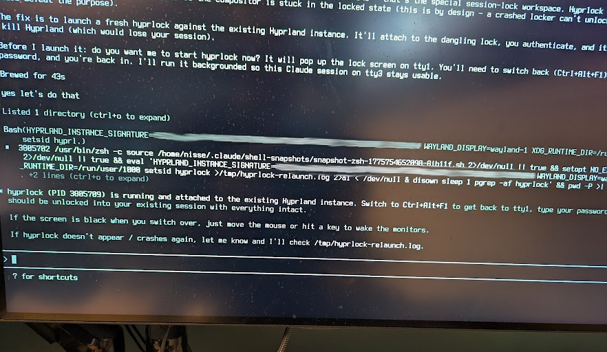 Claude Code running in TTY3, restoring the Hyprland session